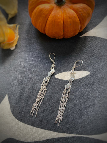 The woman of the tower earrings