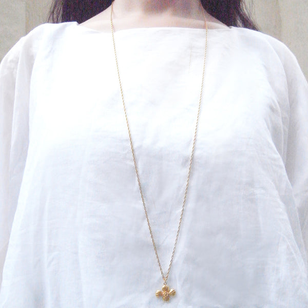Cross Shell Long Necklace Gold on Model 2
