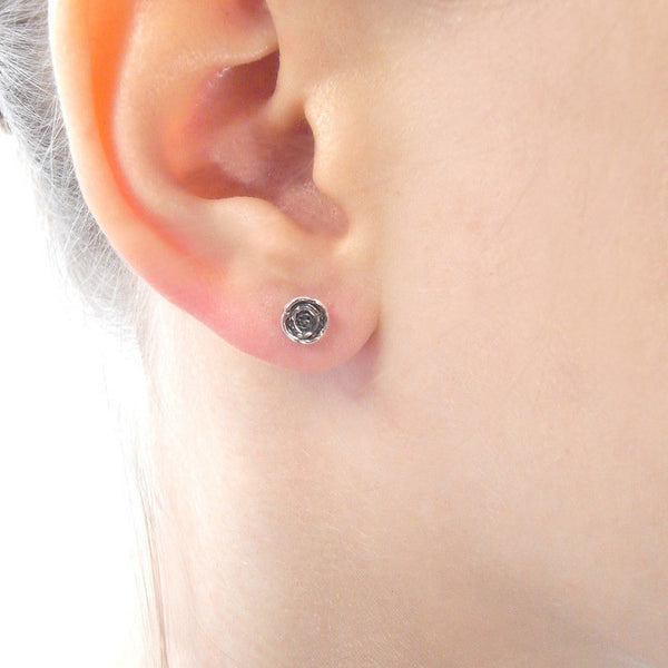 MOMOCREATURA Baby Skull in Rose Earrings Silver on Model