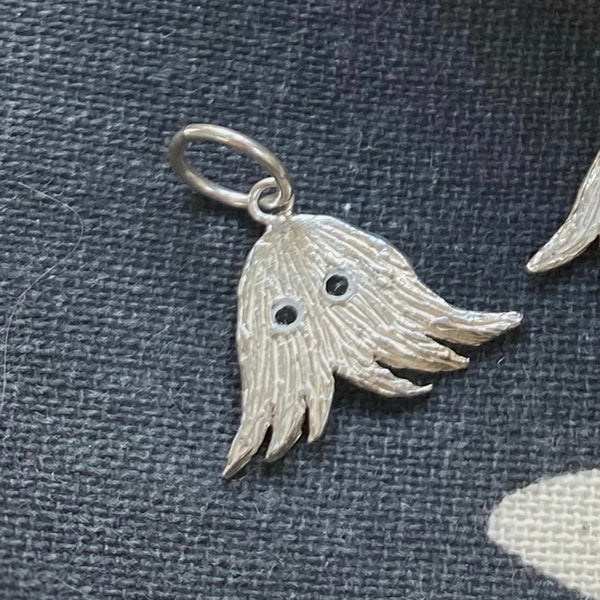 Nine ladies silver charm