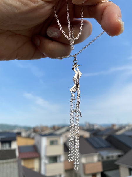The woman of the tower necklace