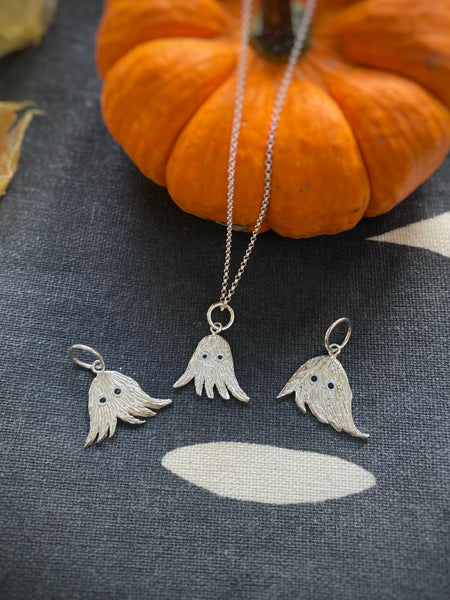 Nine ladies silver charm