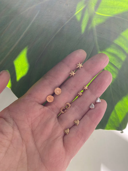 Micro crescent moon stud earrings