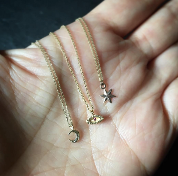 Micro crescent moon necklace 9k gold