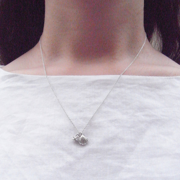 Shell and Tiny Star Necklace Silver on Model