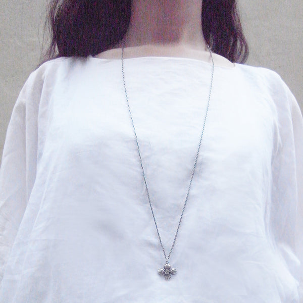 Cross Shell Long Necklace Silver on Model 2