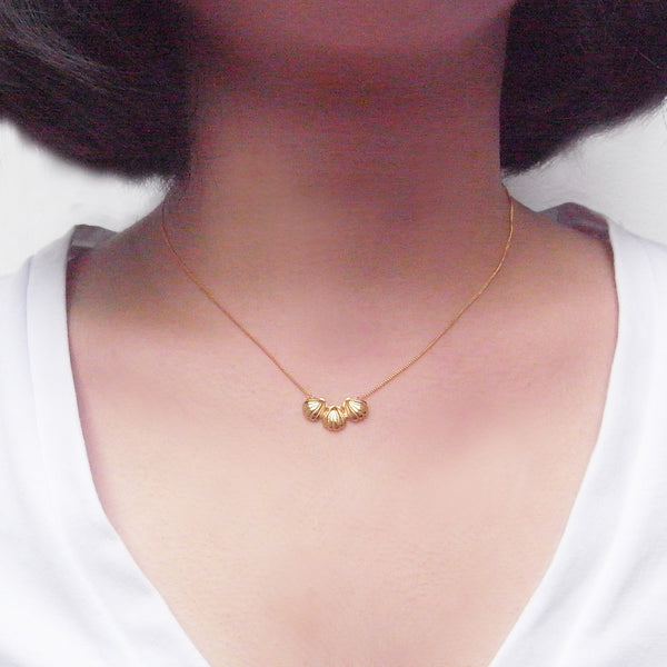 Triple Shell Necklace Gold on Model
