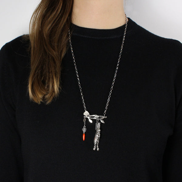 Hanging rabbit with carrot necklace