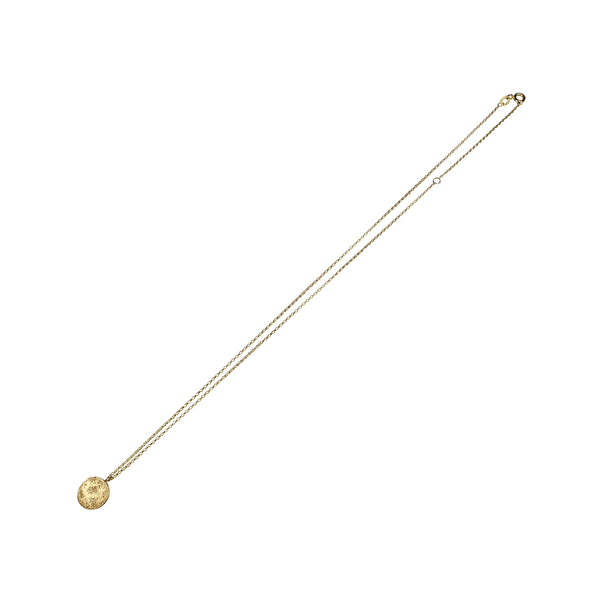 A 9k recycled gold necklace with a textured circular pendant and a delicate diamond cut trace chain, 