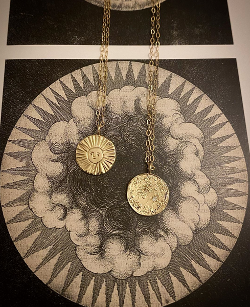 9k recycled gold  sun and moon disc necklace on alchemical background