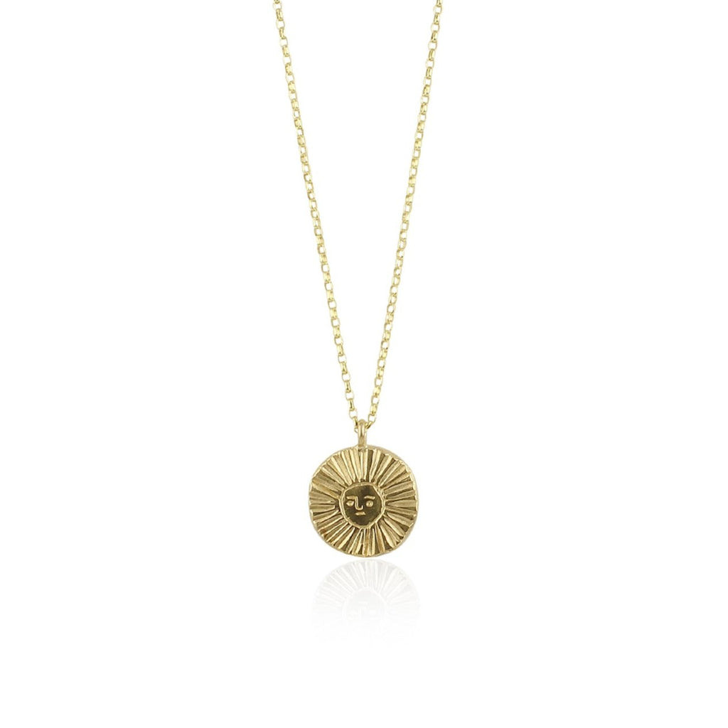 9k recycled gold smily sun disc neckalce on white back ground