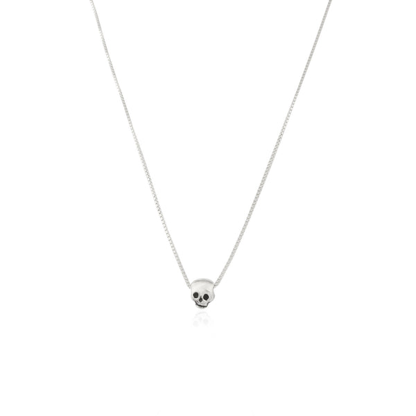 MOMOCREATURA Recycled sterling silver tiny skull necklace on a silver box chain, minimalist memento mori jewellery