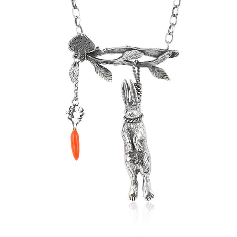 Hanging rabbit with carrot necklace