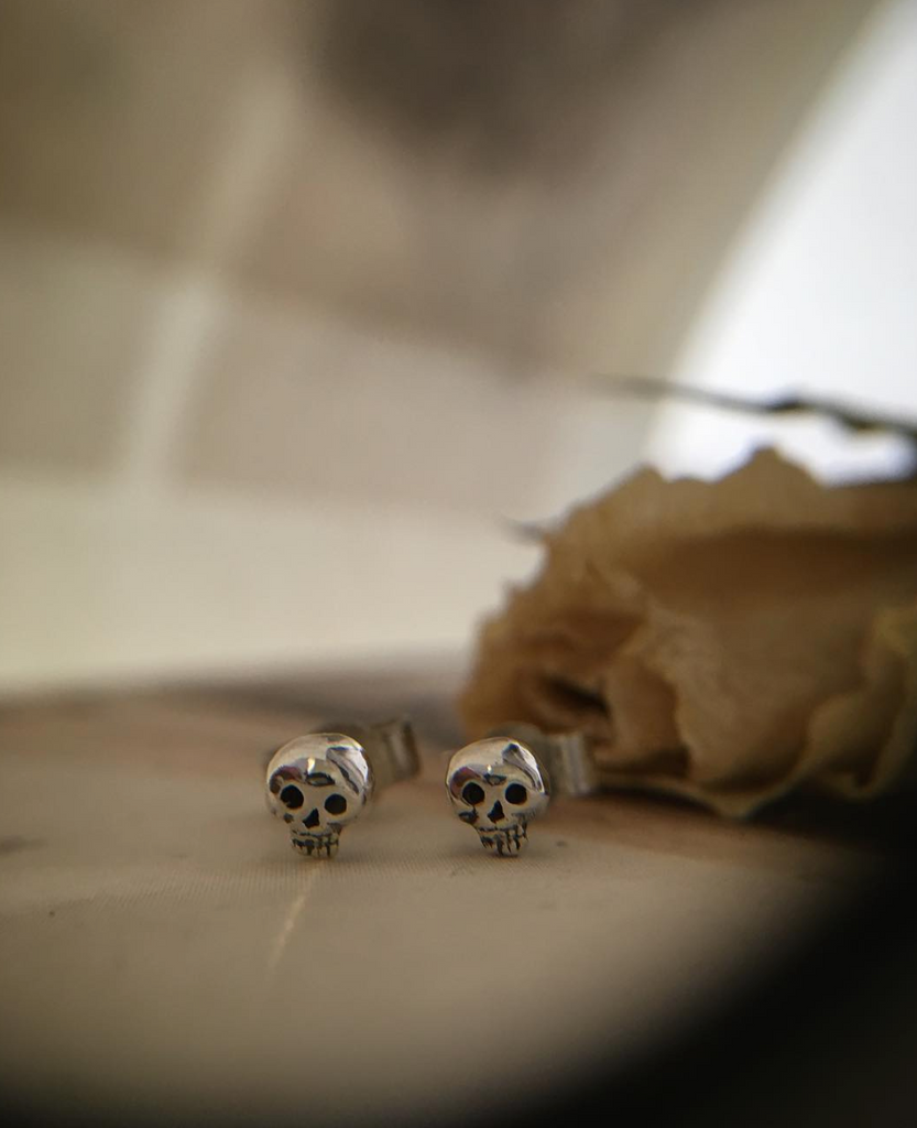 Skull sales stud earrings