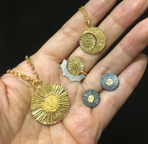 Sun disc earrings gold x black