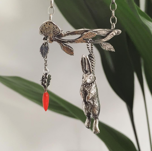 Hanging rabbit with carrot necklace