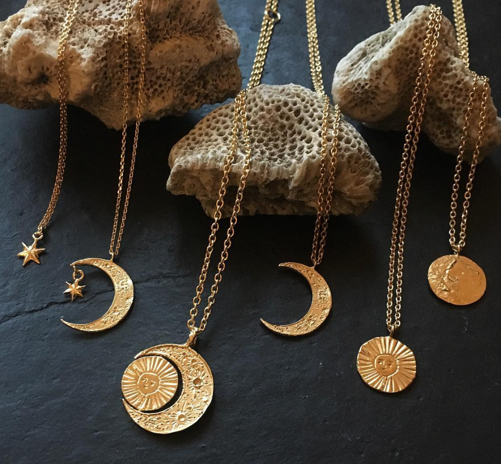 Gold sun sales and moon necklace
