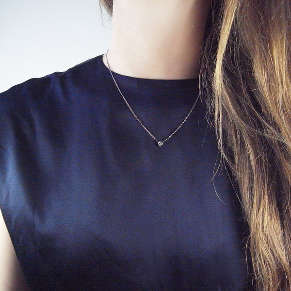 MOMOCREATURA Baby Skull Necklace Silver on Model
