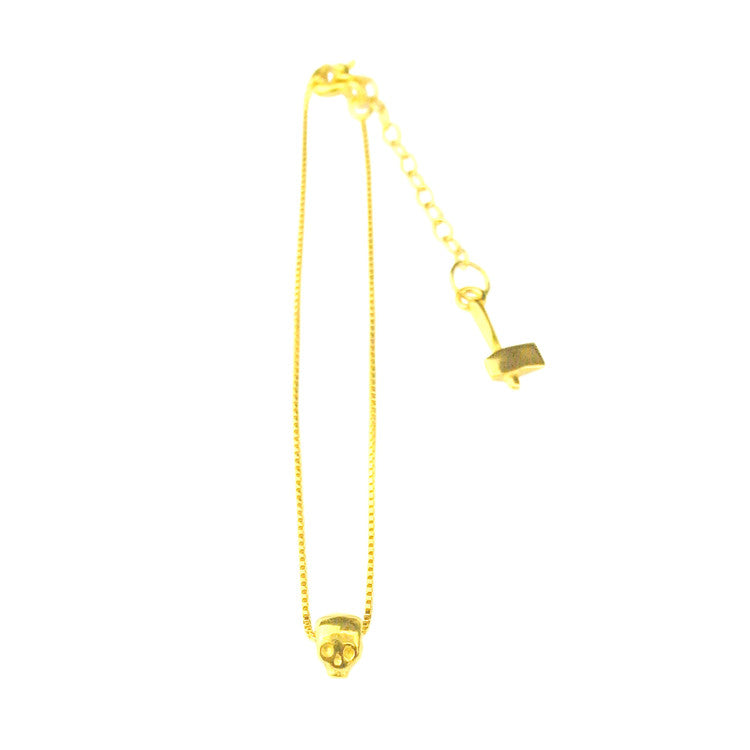 23k gold vermeil recyceld silver tiny skull bracelet and axe on a gold box chain, minimalist memento mori jewellery