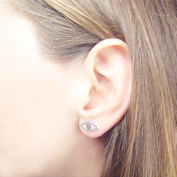 Eye and Ray Earrings Silver on Model 02