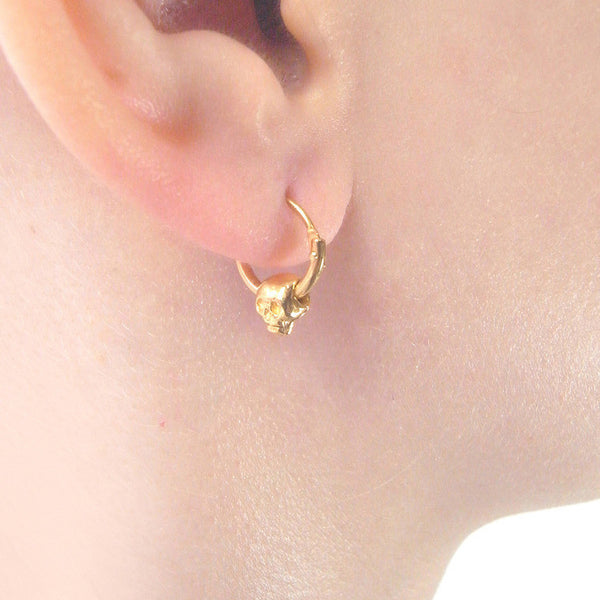 MOMOCREATURA Baby Skull Hoop Earrings Gold on Model