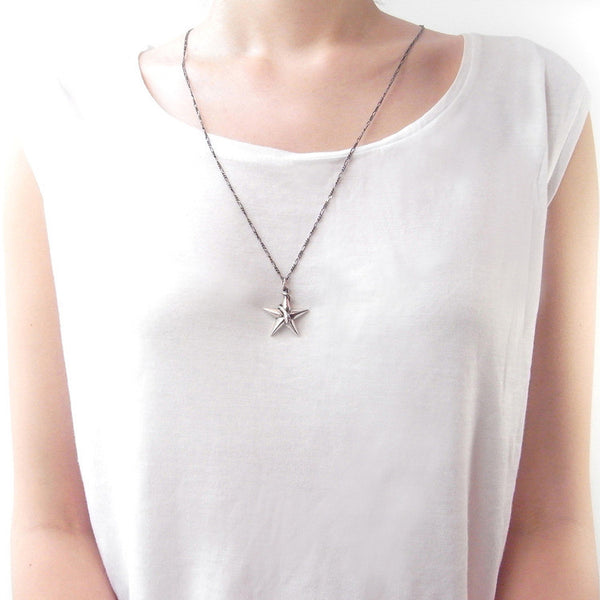 Snake Catching A Star Pendant on Model
